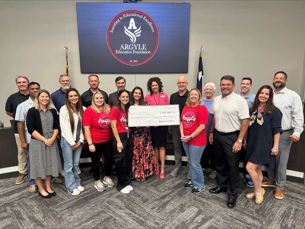 AEF presenting $142,800 check to Argyle ISD in October 2025